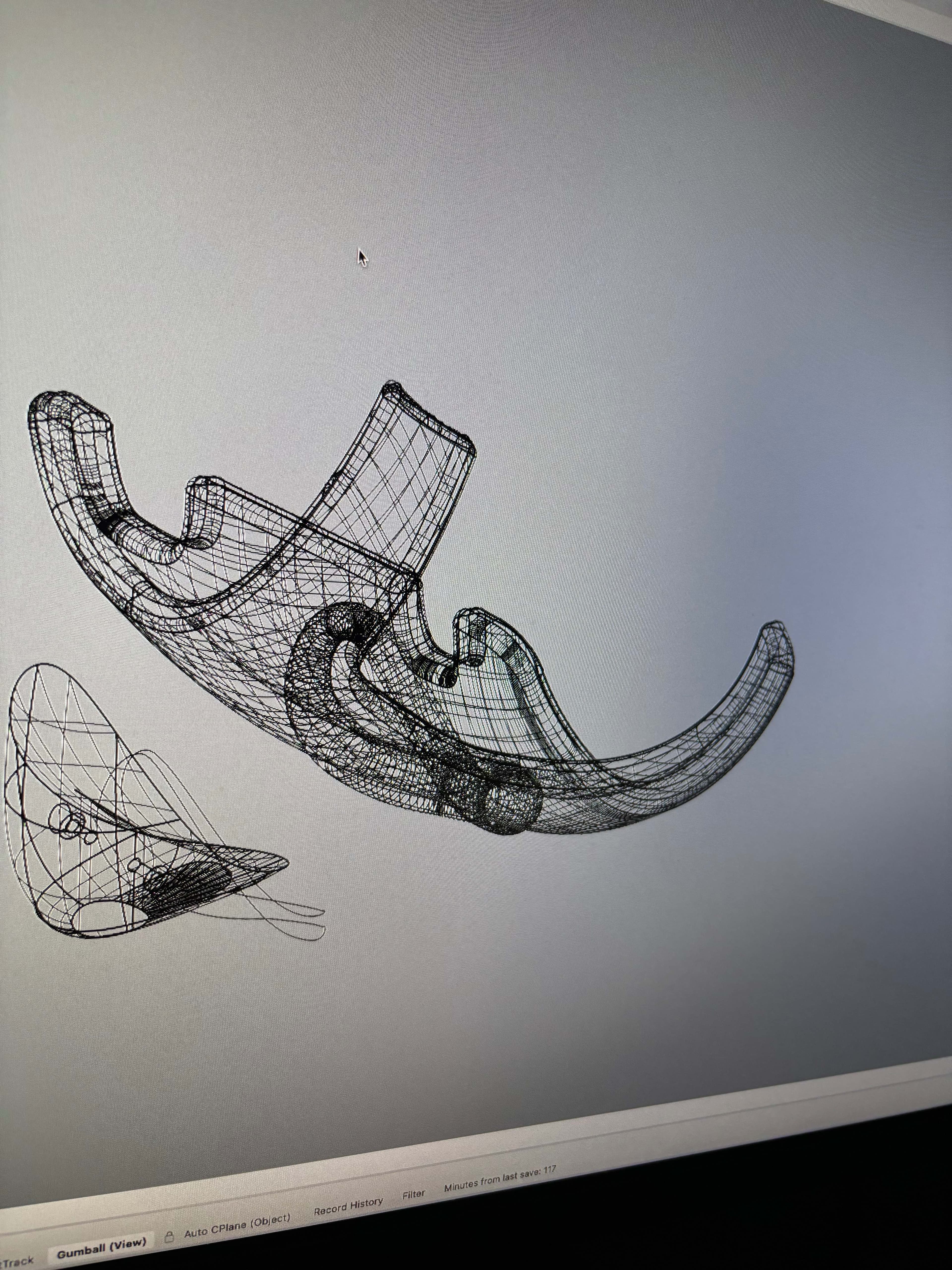 3D wireframe model of prosthetic design on computer screen